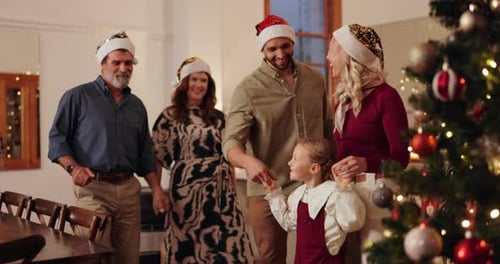 Family Celebrating Christmas at Home with Love