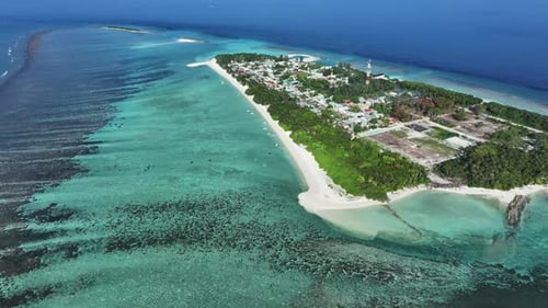 Aerial view of island with buildings, Maldives.