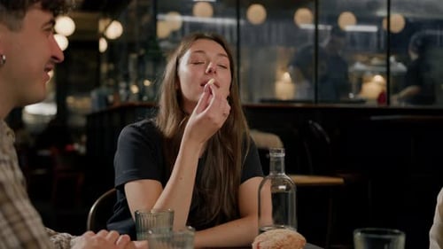 Young Adults Dining in a Restaurant