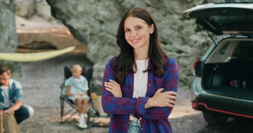 Woman Smiling on Family Camping Trip