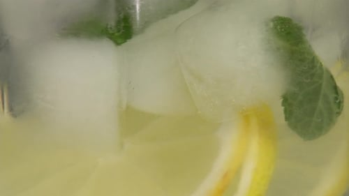 Refreshing Drink Being Stirred Close Up
