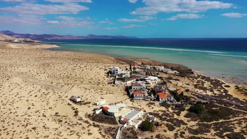 View on the beach Sotavento with golden sand and crystal sea water of amazing colors on Costa Calma