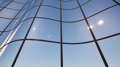 El moderno edificio curvo con fachada de vidrio y elegantes ventanas crea una silueta arquitectónica sorprendente