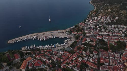 Aerial The Sea Coastal City on the Rocky Coast at Sunset