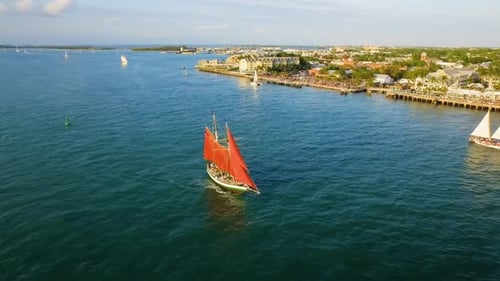 Sailboat with Red Sails Aerial