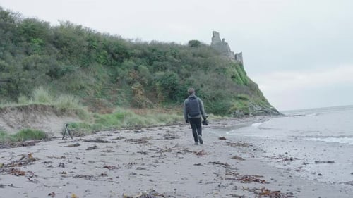A Videographer on location at the beach