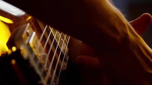 Close Up of Guitarist Playing Electric Guitar