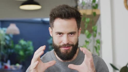 Man with Beard Talking Indoors Close Up
