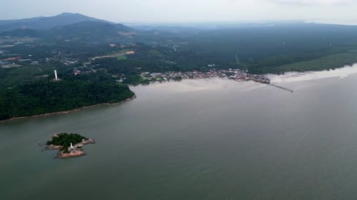 Sea with a small island in the middle. Aerial scenery of Segenting, Batu Pahat.