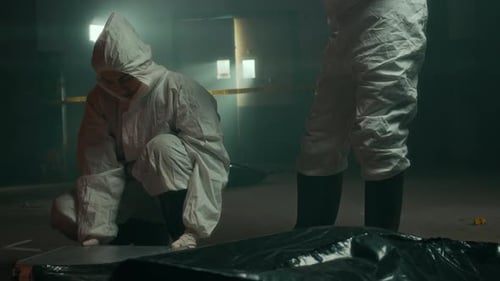 Investigators Examine Crime Scene in Protective Suits