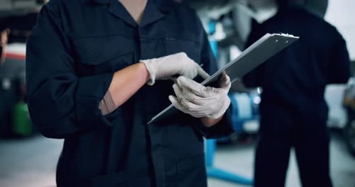 Mechanic, hands and checklist with car shop, calibration or maintenance garage