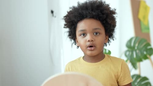 Close up portrait of little boy nice look attractive charming cute lovely cheerful boy