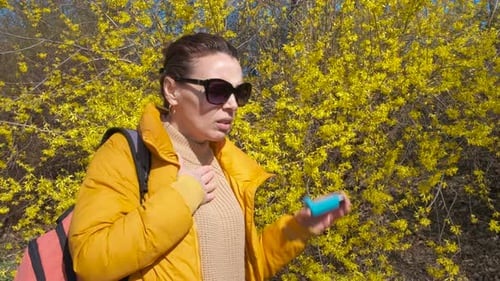 Woman Hard Breathing in Sunny Park
