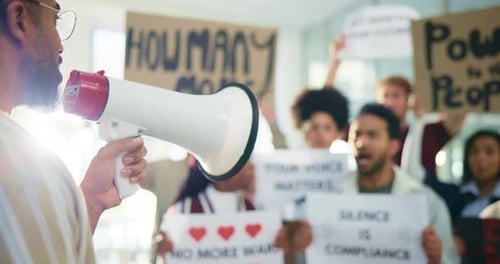 Group of Protesters Marching and Speaking Out