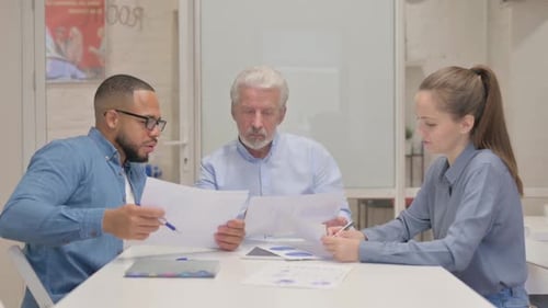 Business Teamwork in Modern Bright Office