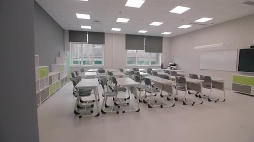 Empty Classroom with Desks and Whiteboard