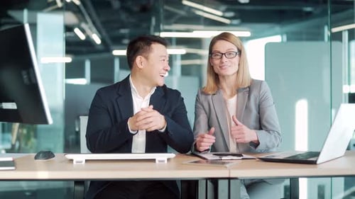happy team of business employees at an online meeting look at camera and communicate. Webcam view.