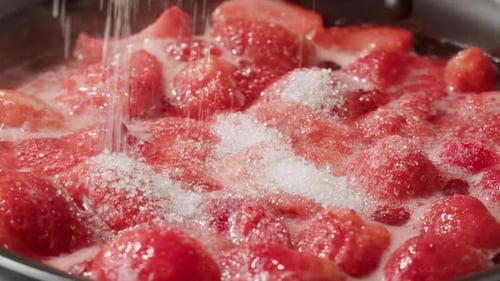 Strawberries Simmering with Sugar in Pan