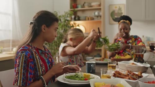 Family and Friends Share a Festive Meal Together