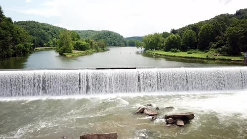 Fries Virginia. Wide shot pushing into hydroelectric dam near old textile plant site in mill town