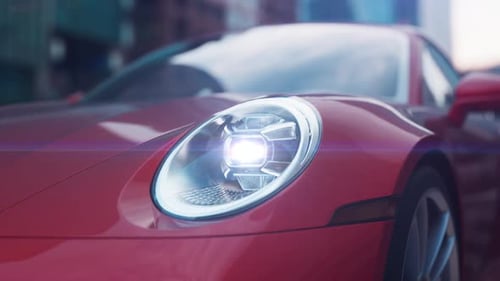 red car close-up shines headlights in urban environment camera movement with Dolly Zoom effect