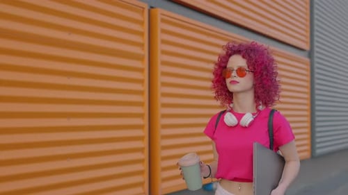 A Pink Curly Woman is Walking to Work or College