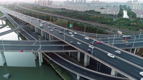 Aerial View of Road Junction with Moving Cars Road Interchange or Highway Intersection with Busy