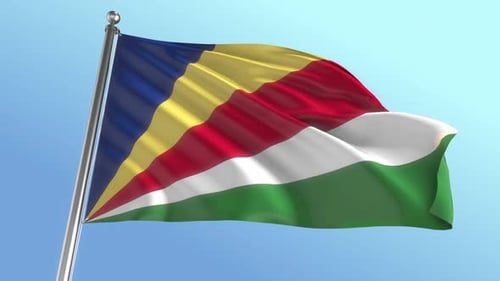 Waving Seychelles National Flag on Flagpole against Blue Sky