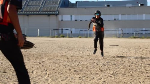 Baseball Player Sliding Safely Into Base During Game
