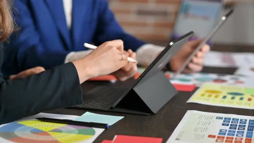 Business session in an office. Woman and a man gesticulating
