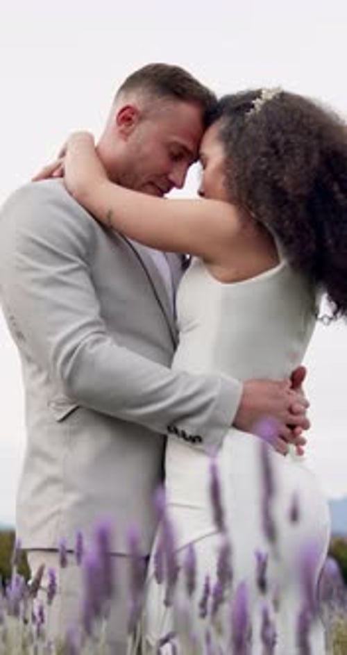 Loving Couple Embrace in Lavender Field Wedding