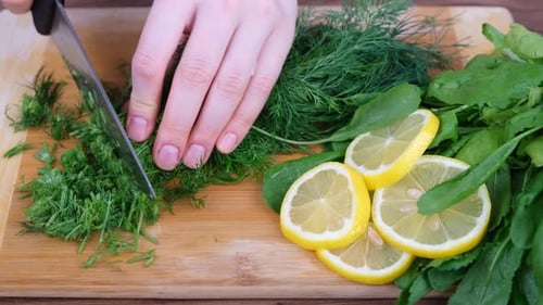 cutting green vegetables