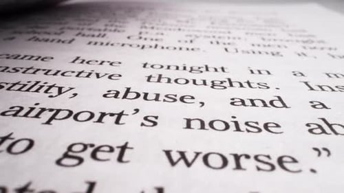 Page of Novel Book with Printed Text in Light Studio Macro