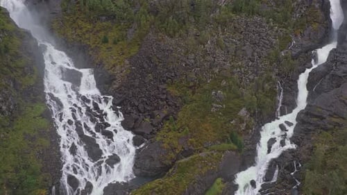 Scenic drone shot of Latefossen in rugged Norway mountain region