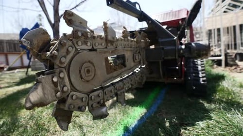 Backfill Blade Of A Trenching Machine Outdoor. closeup