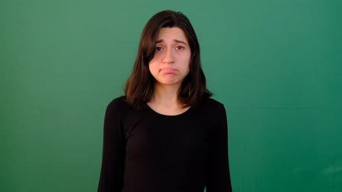 Woman Making Sad Faces on Green Screen