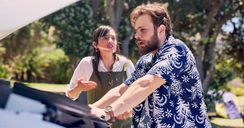 Frustrated couple, car trouble and argument with fight for road side assistance or breakdown