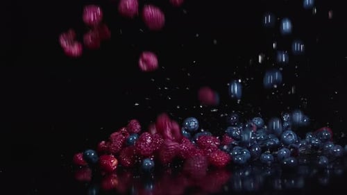 Falling Raspberries and Blueberries in Slow Motion