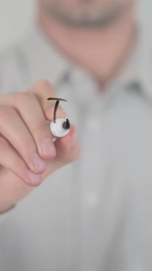 Adult Man Writes Tax Refund on Glass Surface