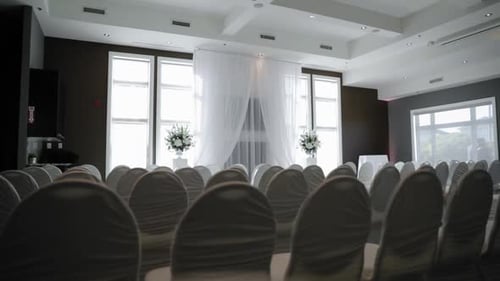 Next Restaurant in Stittsville Ontario set up for a beautiful wedding ceremony with white décor, cha