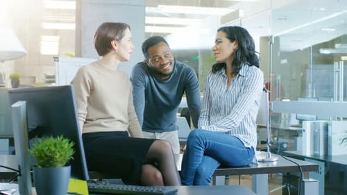 Diverse Group of Talented Young Professionals Chatting, Joking and Having Fun on a Coffee Break. St