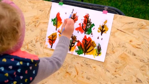 Child Drawing Autumn Leaves Selective Focus