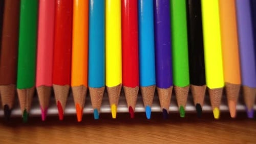 Brightly Colored Pencils Lined Up in a Row