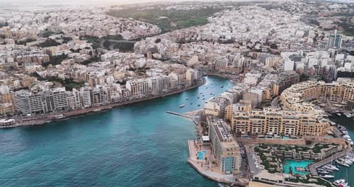 Aerial view of St. Julian's bay and buildings, Malta.