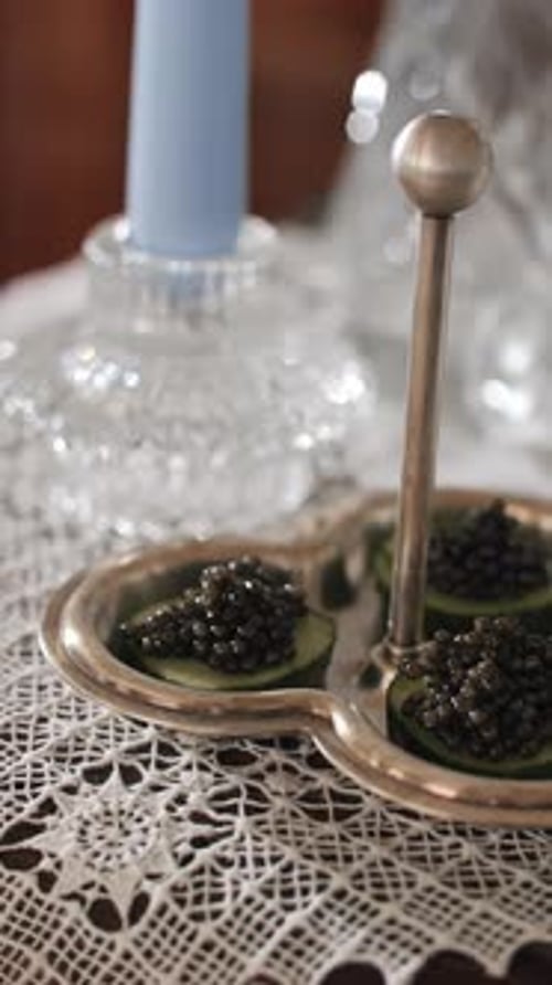 Caviar Appetizer on Silver Tray with Lace Tablecloth