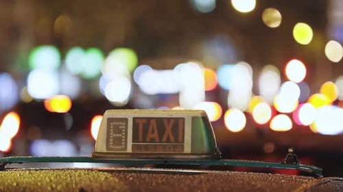 Close Up of a Taxi Cab at Night