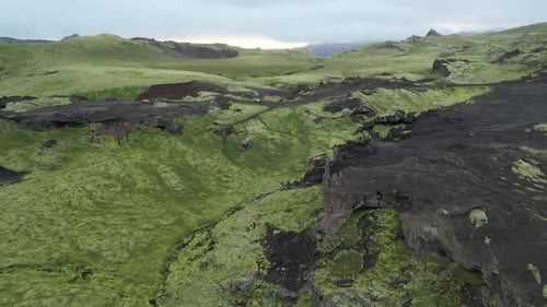 Aerial View of Iceland's Natural Landscape Featuring Scenic Mountain Ranges