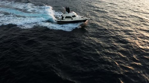 Aerial View Of Speedboat Cruising At Sunrise In Adriatic Sea, Croatia. - orbit