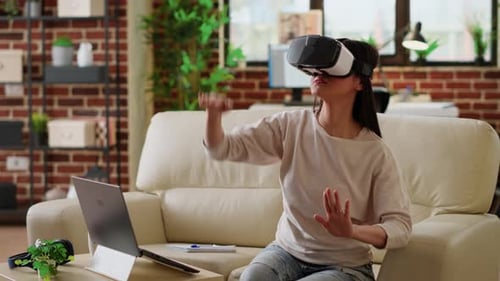 Woman Using VR Headset in Home Setting
