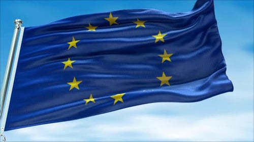 European Union Flag Waving Against Blue Sky Loop